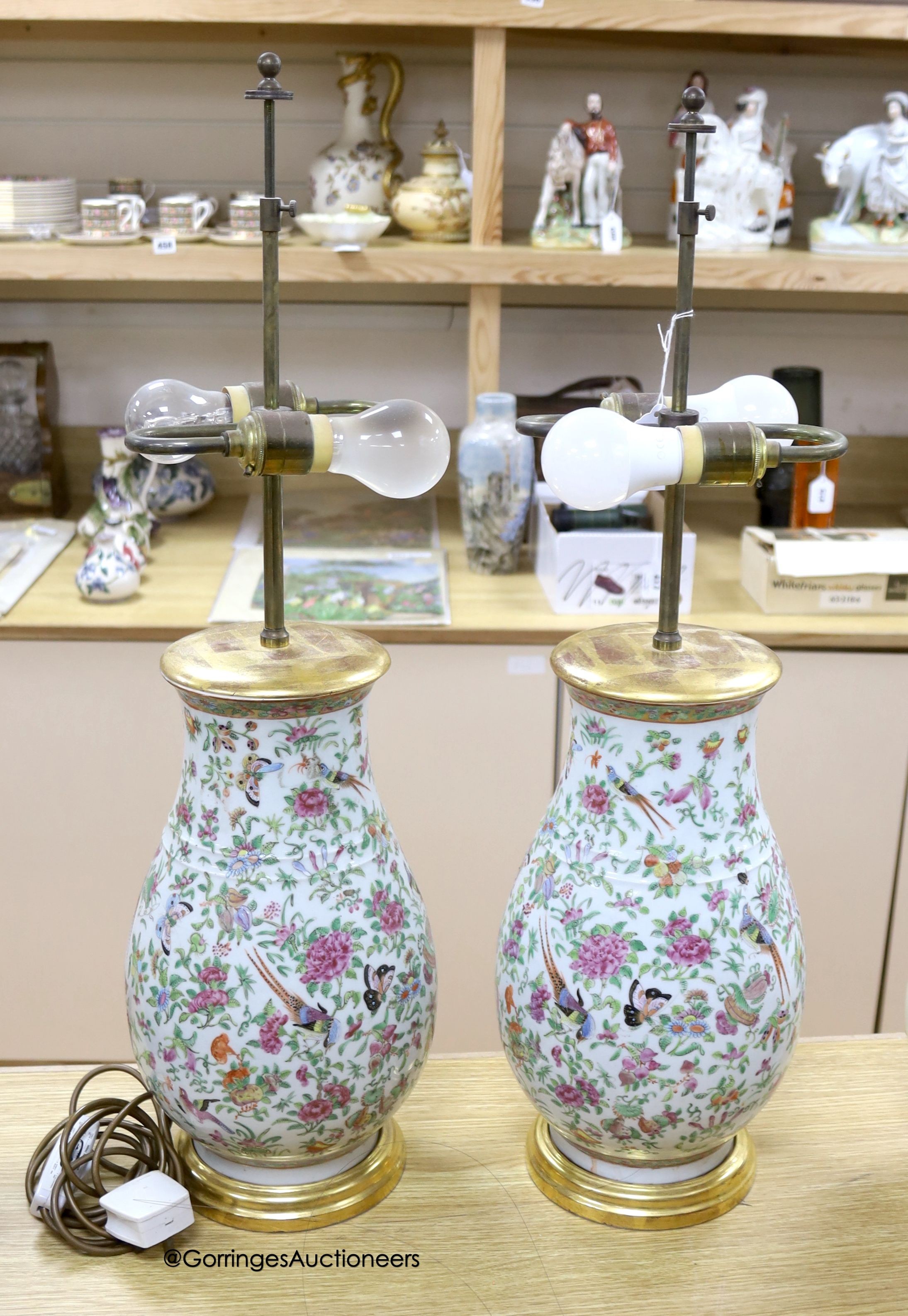 A pair of Chinese famille rose converted lamps, overall height 74cm